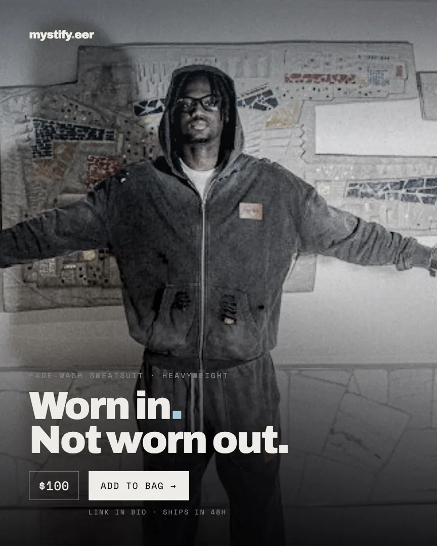 A model in the fade-wash heavyweight sweatsuit with arms outstretched, headlined Worn in. Not worn out.