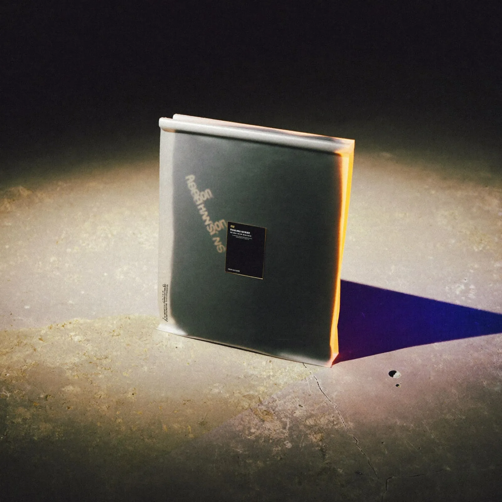 Verus campaign visual: a matte pouch under hard light on concrete